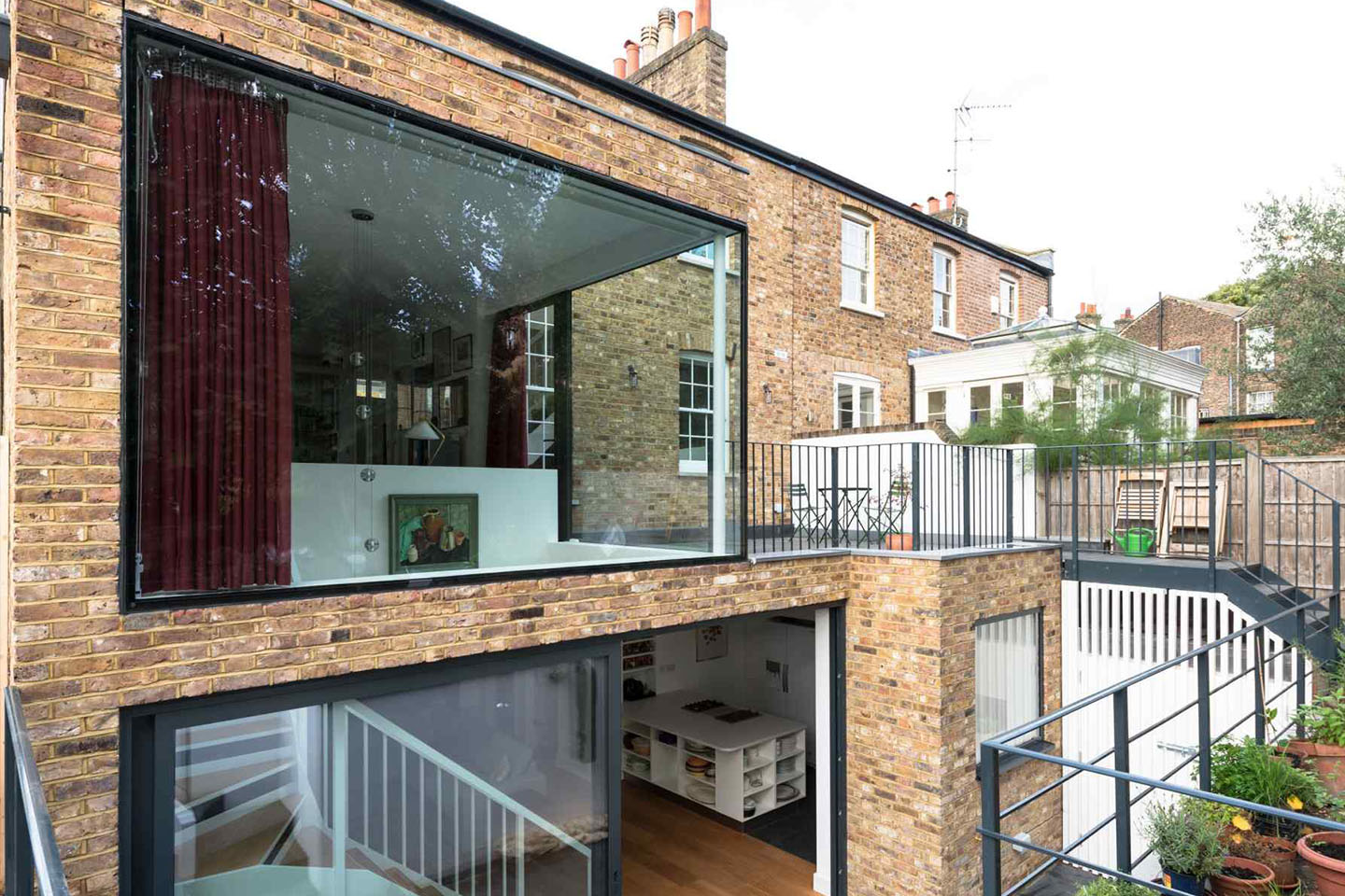 Two-storey glass extension on the rear of the Victorian house at Turret Grove
